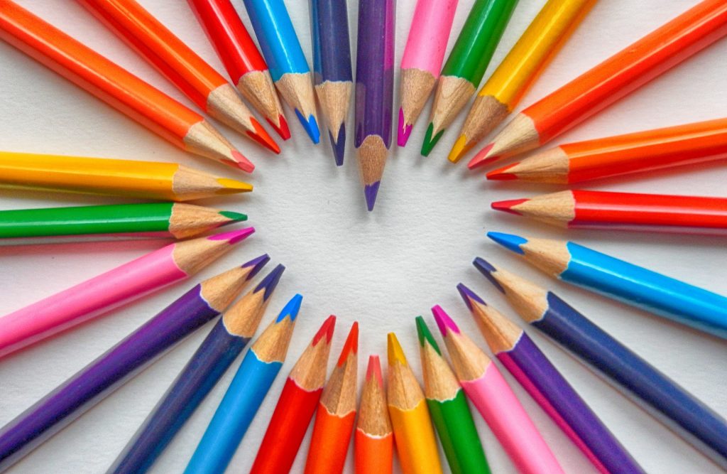 colored pencils in the shape of a heart