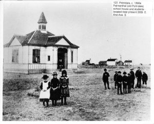 The Palmenthal schoolhouse and students in old Palmdale