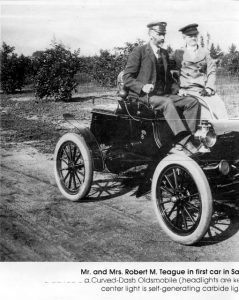 Mr. and Mrs. Robert M. Teague in the first car in San Dimas