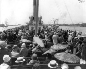 Top deck of the S.S. Catalina filled with passengers as the steamer leaves a Southern California harbor, c. 1920s