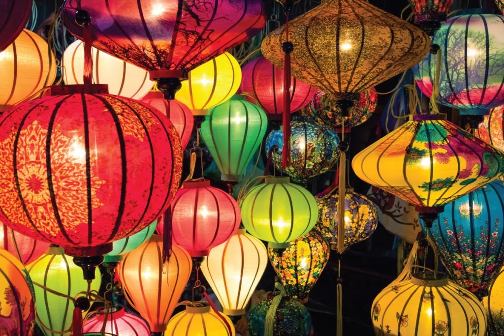 asian lanterns of all different shapes, sizes, and colors