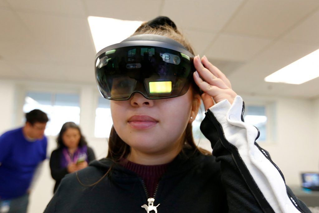 teen using VR glasses
