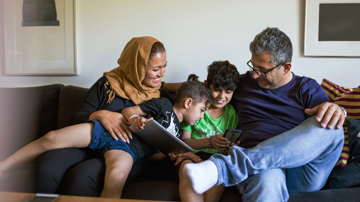 Muslim family reading together