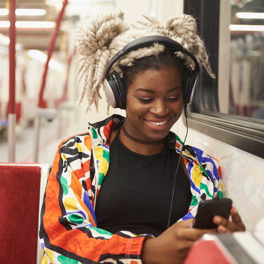woman listening to music on phone