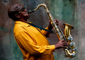 man playing a saxophone