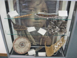 Display case showing American Indian art at the American Indian Resource Center at LA County Library's Huntington Park location