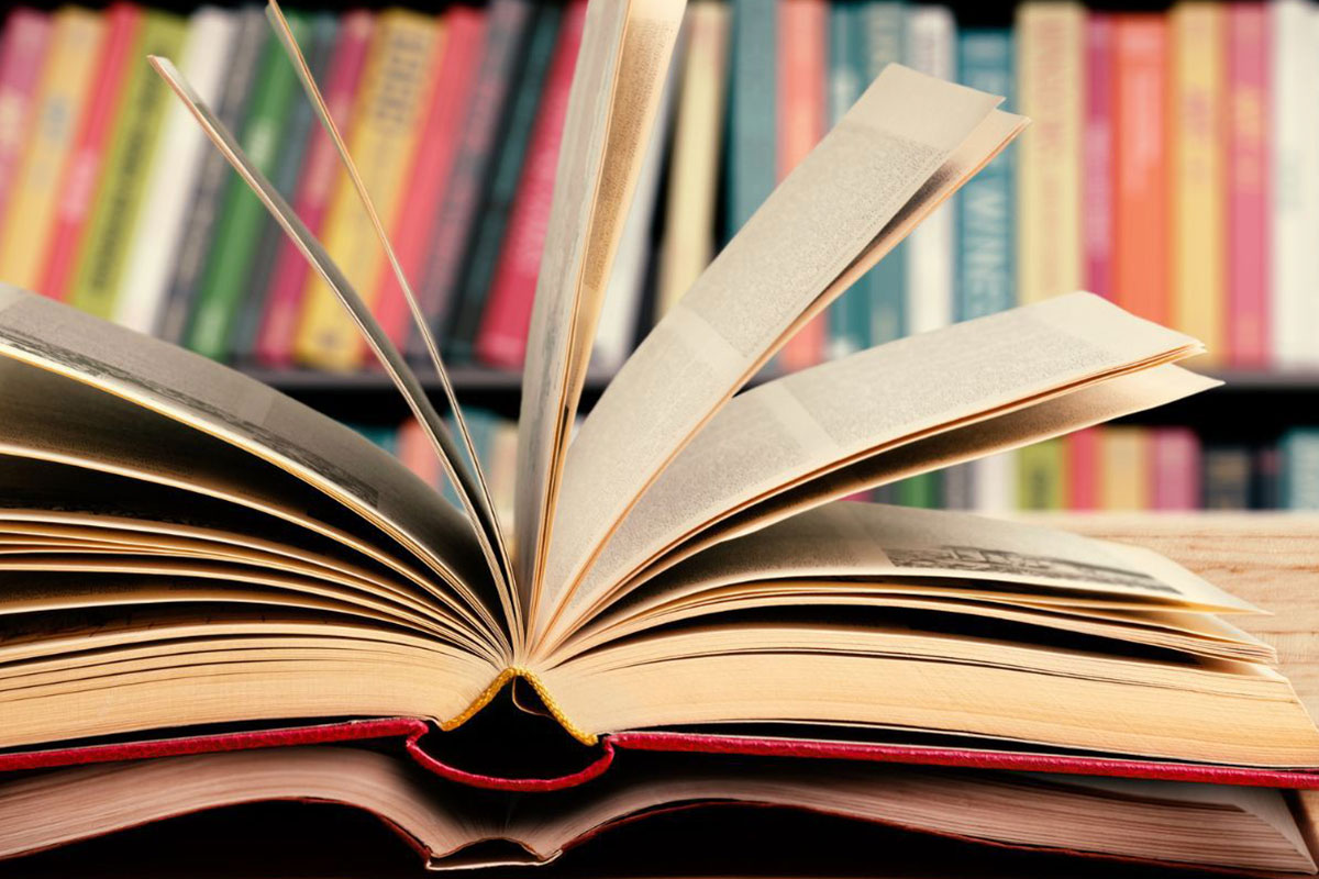 stack of open books
