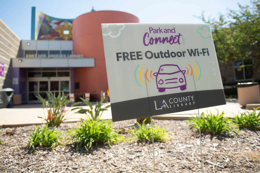 Sign promoting Free Wi-Fi inside and outside LA County Libraries