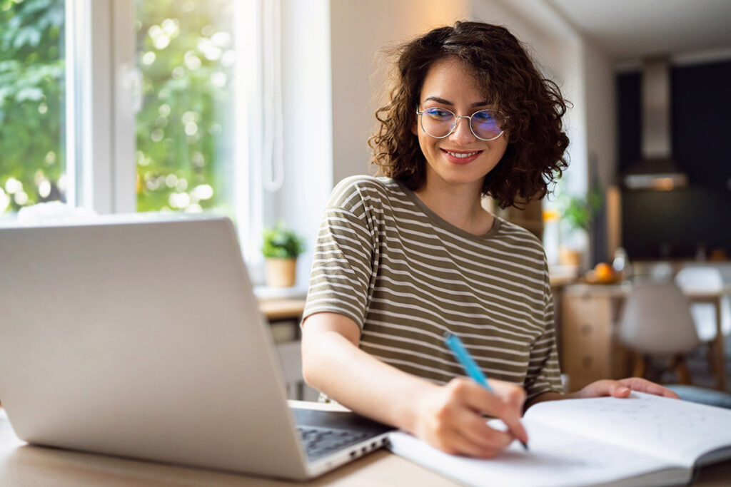 young woman taking a class online