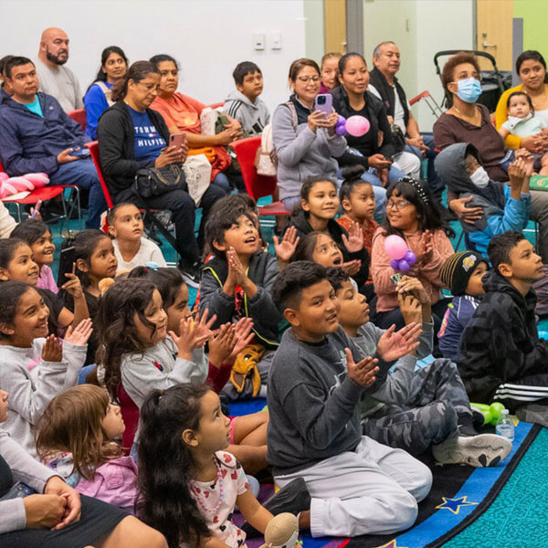 kids and parents enjoying a program at LA County Library