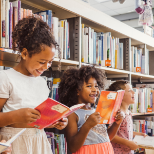 children happily reading books