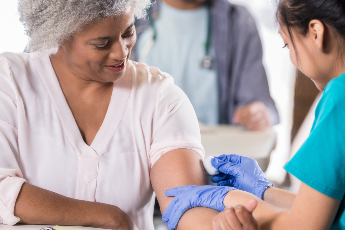 Women getting a vaccine