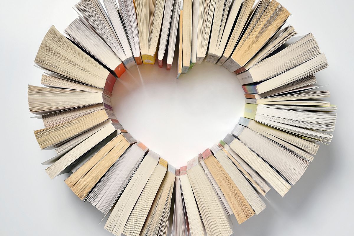 Books organized in the shape of a heart