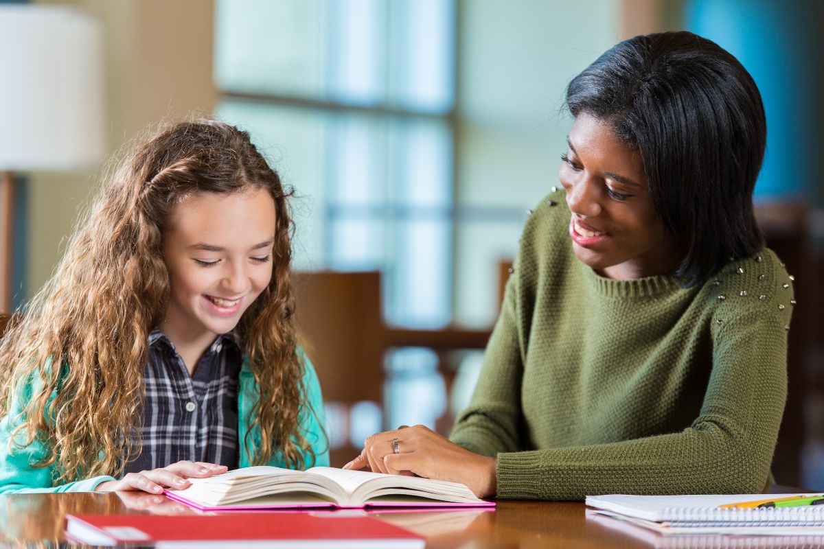 Student and teacher working together