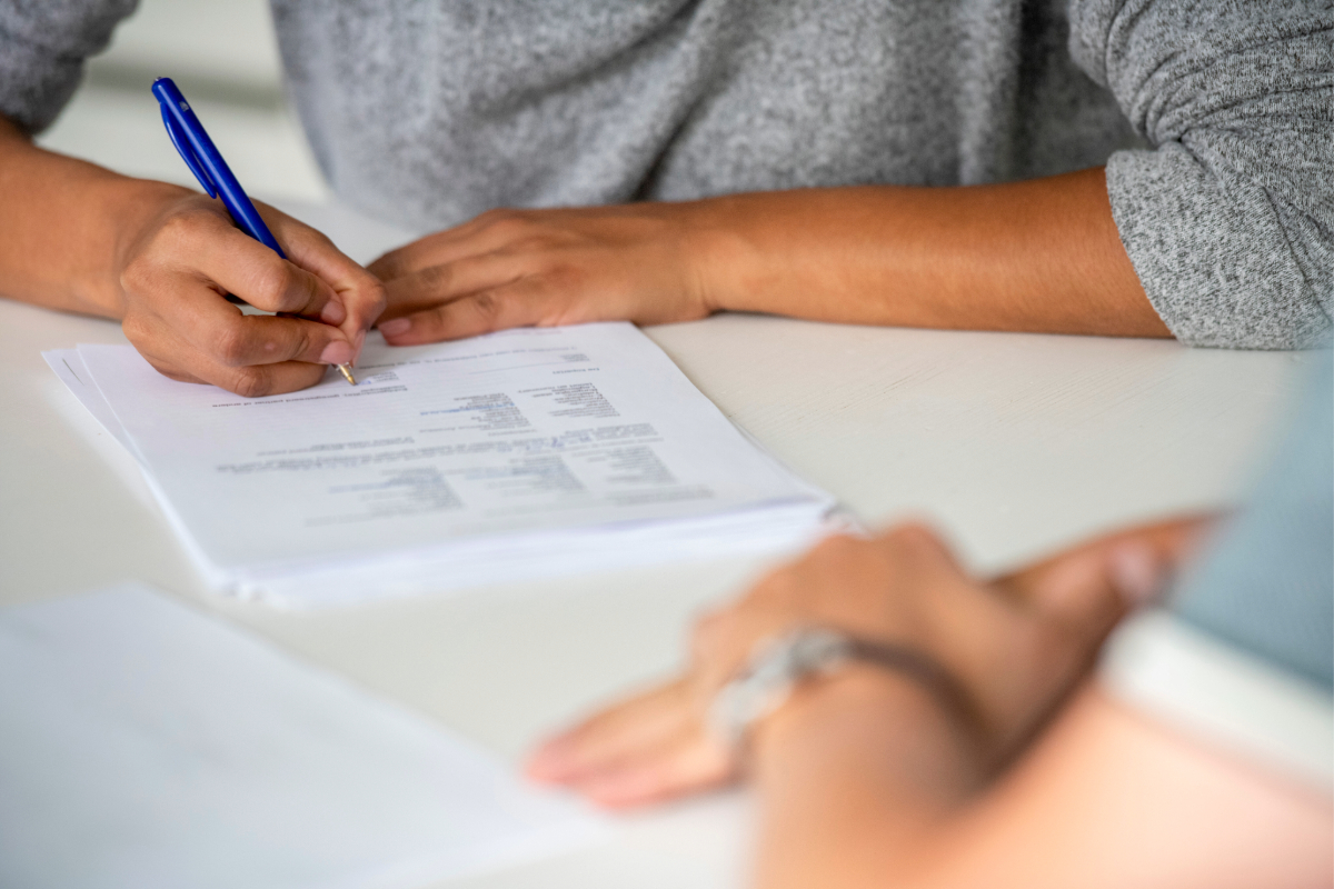 Woman filling out paperwork