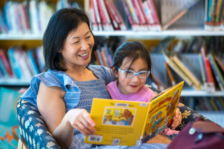 woman reading to a child