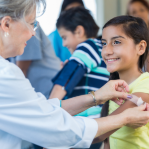 pre-teen getting a vaccination