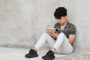 young person writing poetry