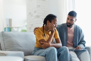 Father and daughter discussing a serious topic