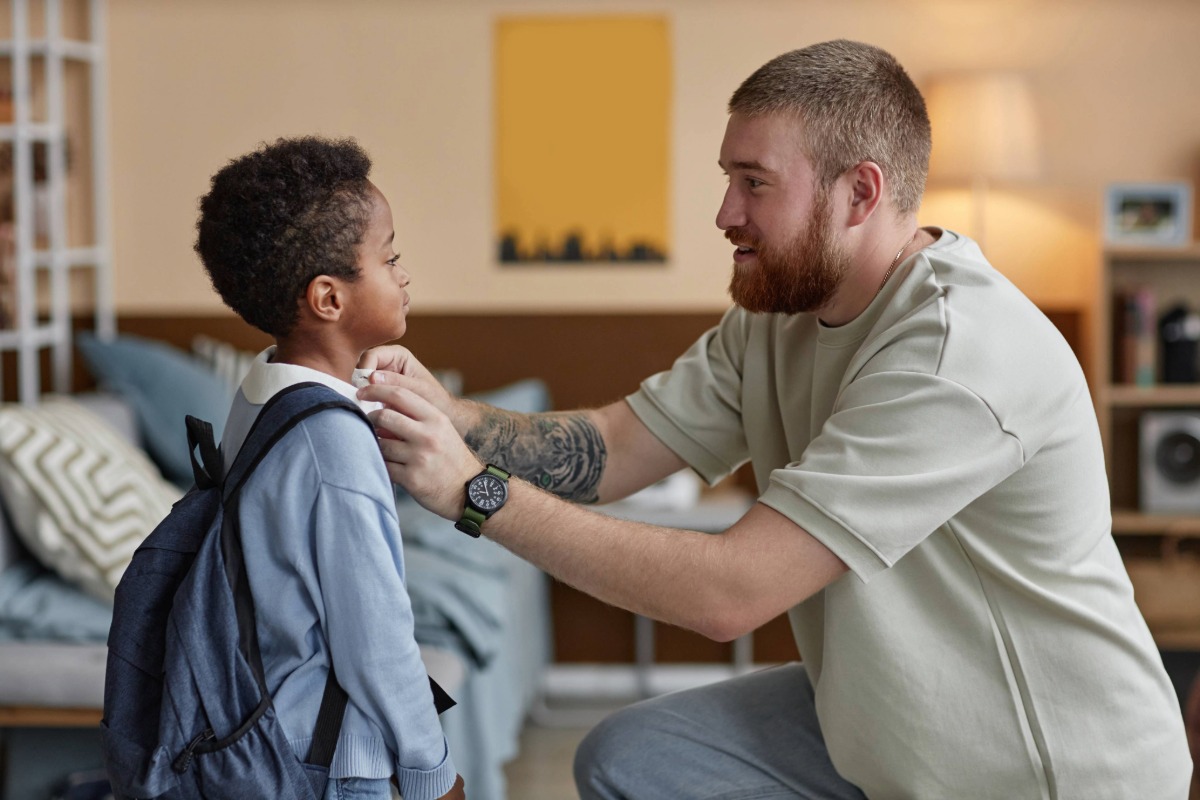 foster father and youth getting ready for school