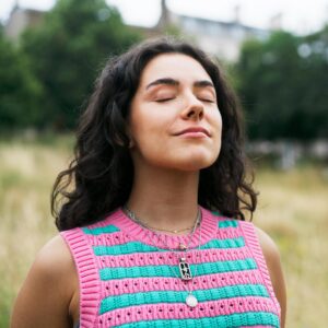 woman meditating outside
