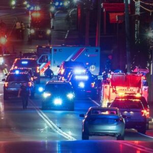 police and emergency vehicles at night