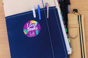 notebook with I love Books (LA County Library) sticker