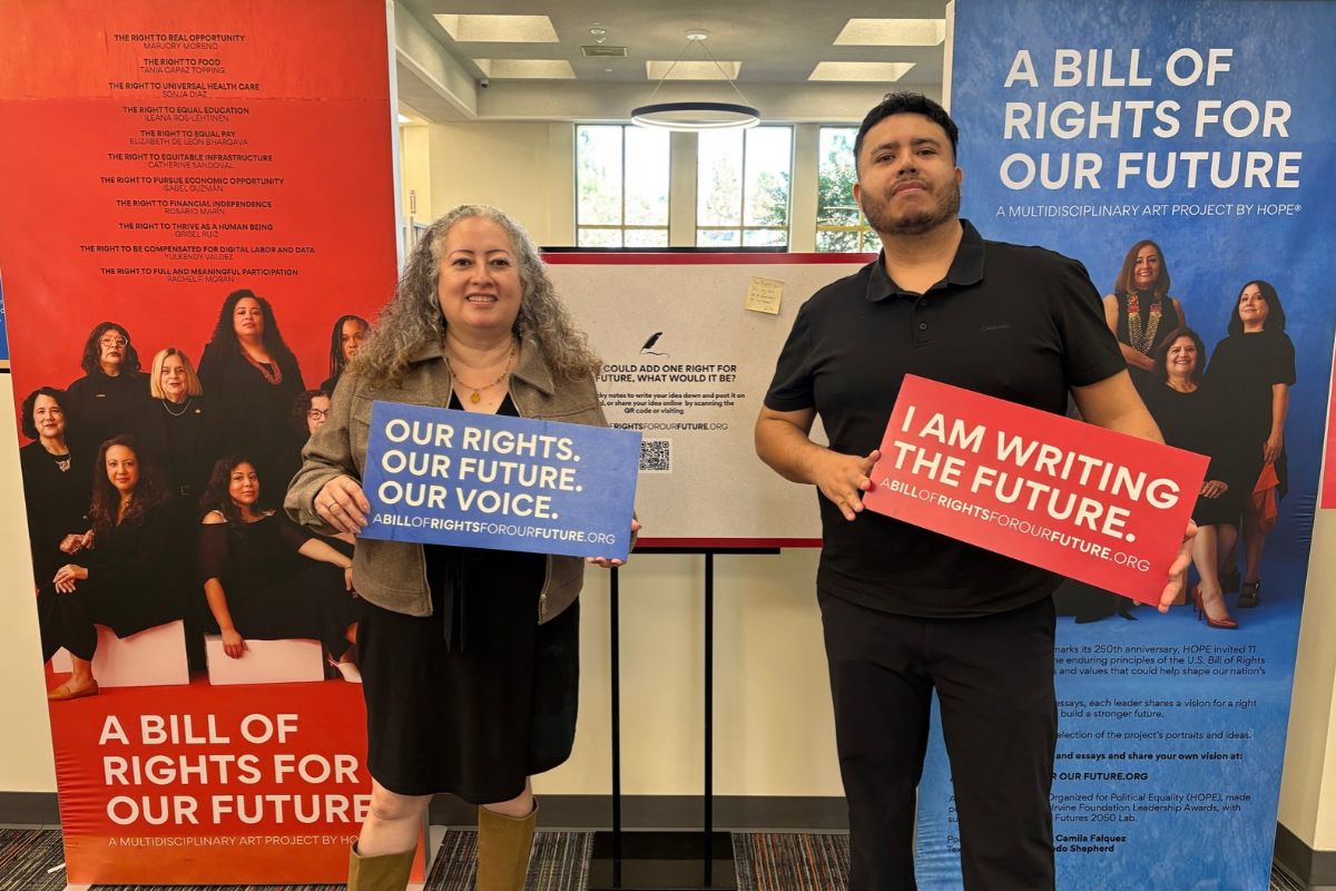 people holding signs about a Bill of Rights for Our Future