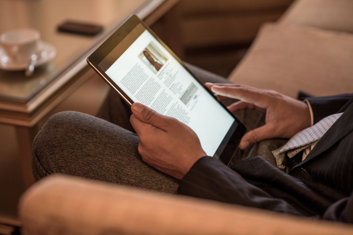 person reading on a tablet